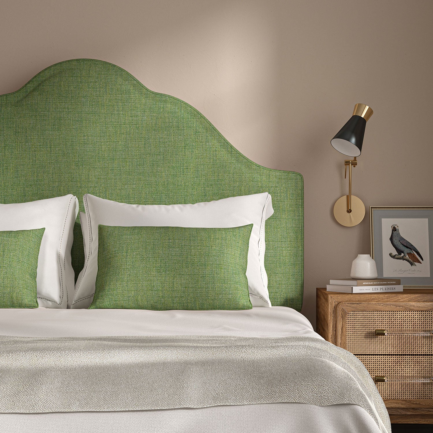 Green headboard upholstered in a versatile woven fabric.