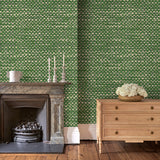 Sitting room featuring green wallpaper with faux basketweave pattern