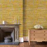 Sitting room with yellow wallpaper with faux basketweave pattern