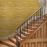 Hall with yellow wallpaper with faux basketweave pattern