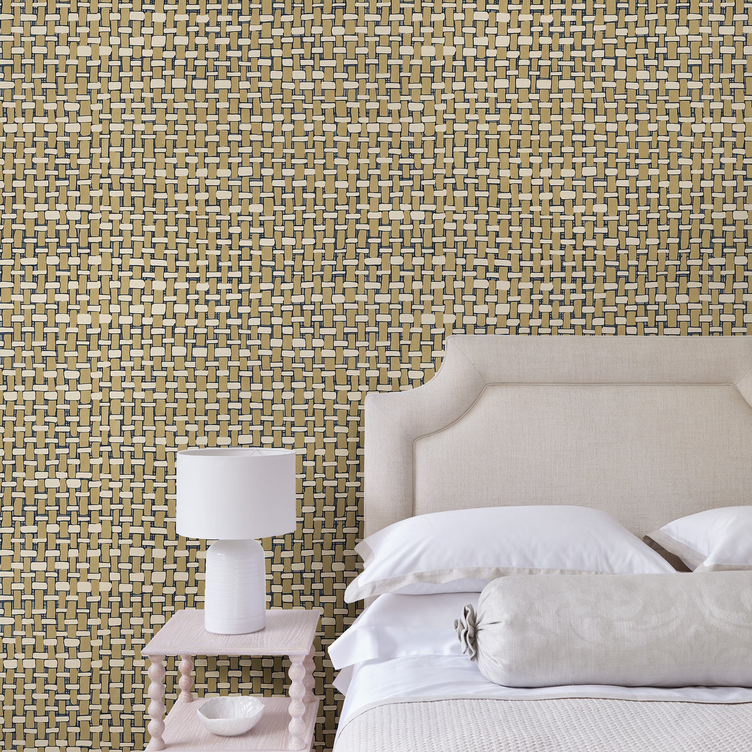 Bedroom with neutral wallpaper with faux basketweave pattern