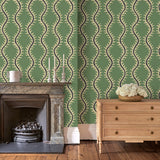 Luxurious wallpaper featuring stylised ferns and wavy lines in green and blue.