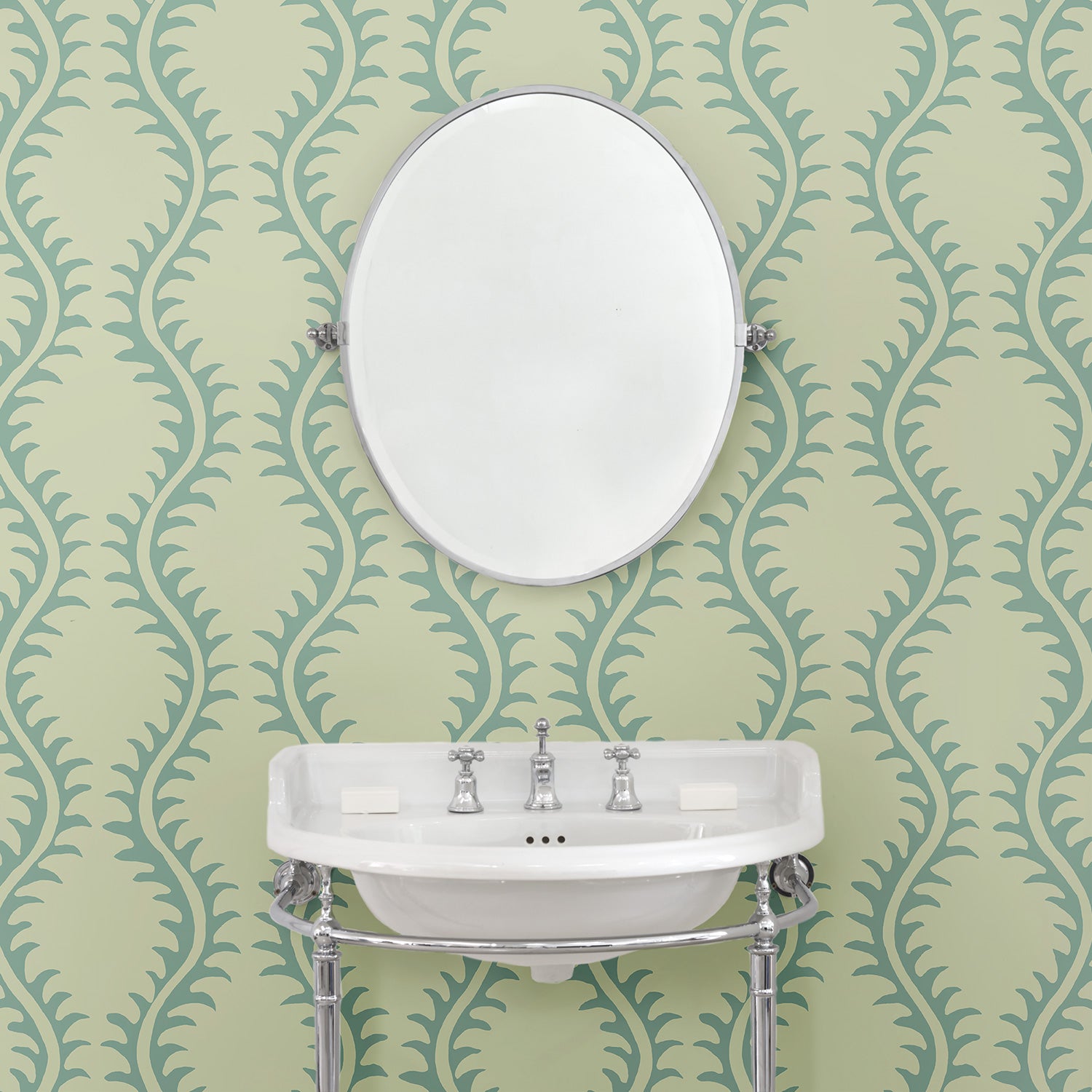 Luxurious wallpaper featuring stylised ferns and wavy lines in blue and cream.