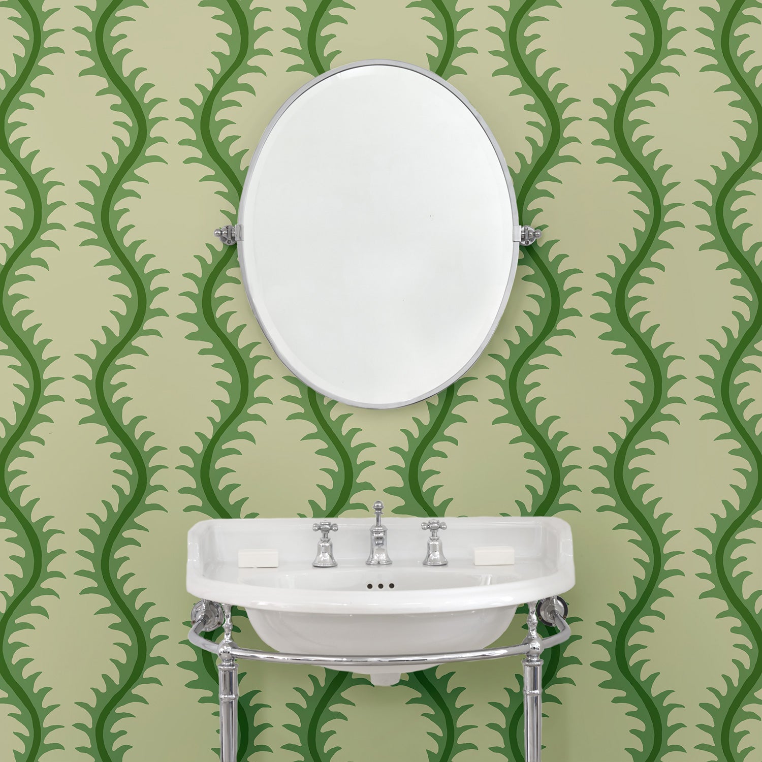 Luxurious wallpaper featuring stylised ferns and wavy lines in green and cream.