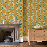 Luxurious wallpaper featuring stylised ferns and wavy lines in yellow and green.