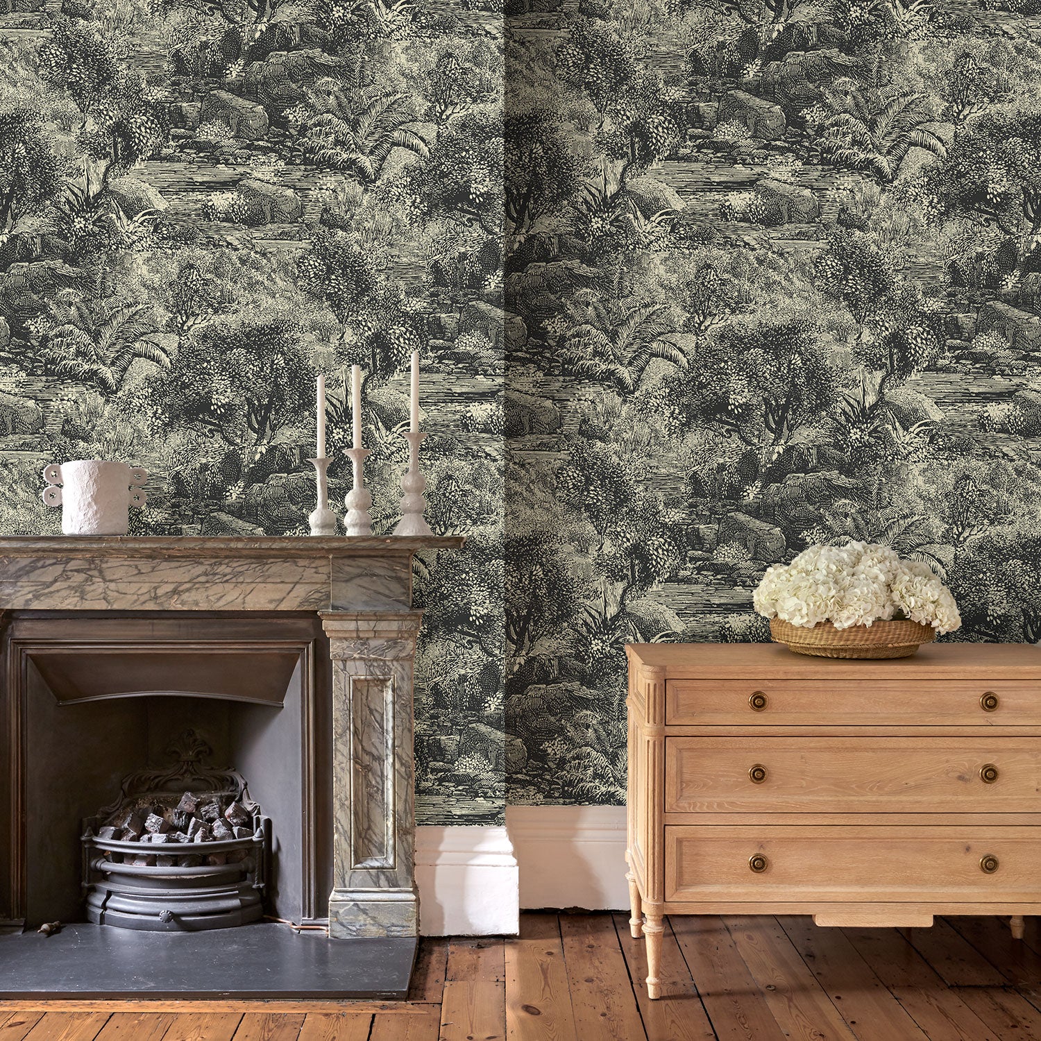 Sitting room featuring a toile-style designer wallpaper in charcoal.