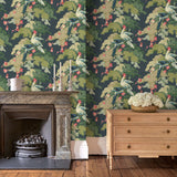 Sitting room showcasing a tropical wallpaper featuring parakeets and pretty blossom.