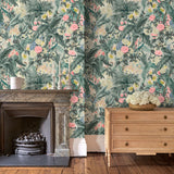 Living room with tropical wallpaper featuring a lush design.