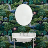 Bathroom with a designer abstract wallpaper featuring a night-time forest design.