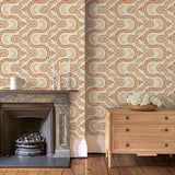 Sitting room with a brown geometric wallpaper.