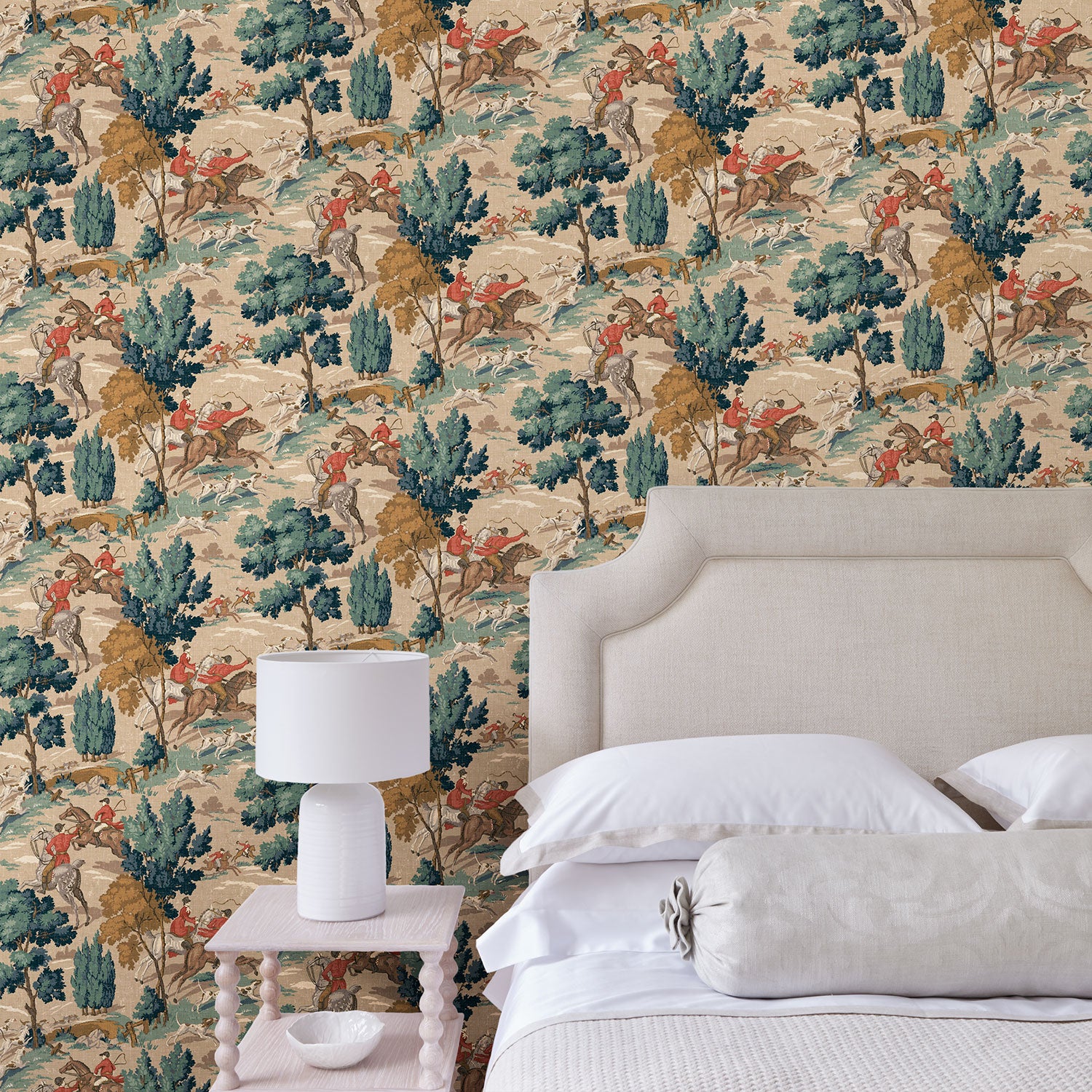 Bedroom showcasing a designer wallpaper featuring the British hunt in blue and biscuit brown.