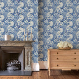 Sitting room with stylish abstract wallpaper featuring dramatic, undulating waves.
