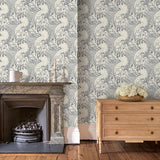 Sitting room with stylish abstract wallpaper featuring dramatic, undulating waves.