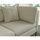 Sofa covered in plain fabric, colour Fawn.