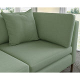 Sofa covered in plain fabric, colour Lichen.