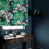 Velvet blind in an aqua coloured floral pattern.