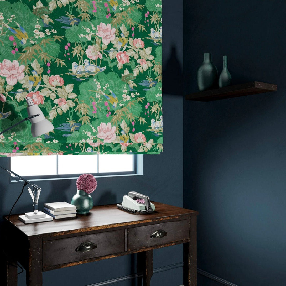Velvet blind in an emerald coloured floral pattern.