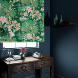 Velvet blind in an emerald coloured floral pattern.