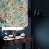 Velvet blind in an ivory and pink floral pattern.