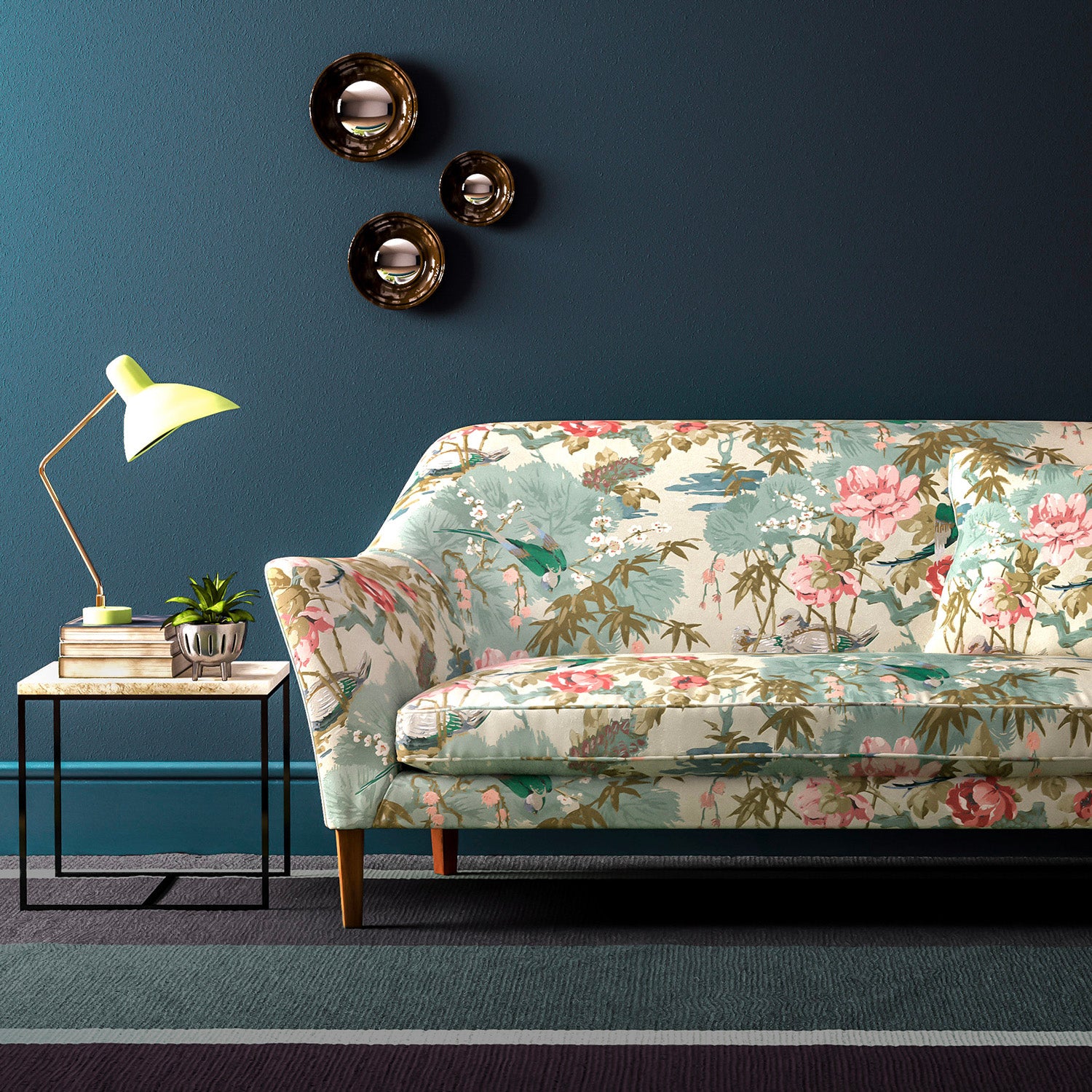 Sofa upholstered in an ivory and pink velvet upholstery fabric with a floral and bird design with a stain resistant finish.