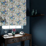 Blind in a velvet fabric with blue and peach floral bouquet and stain resistant finish