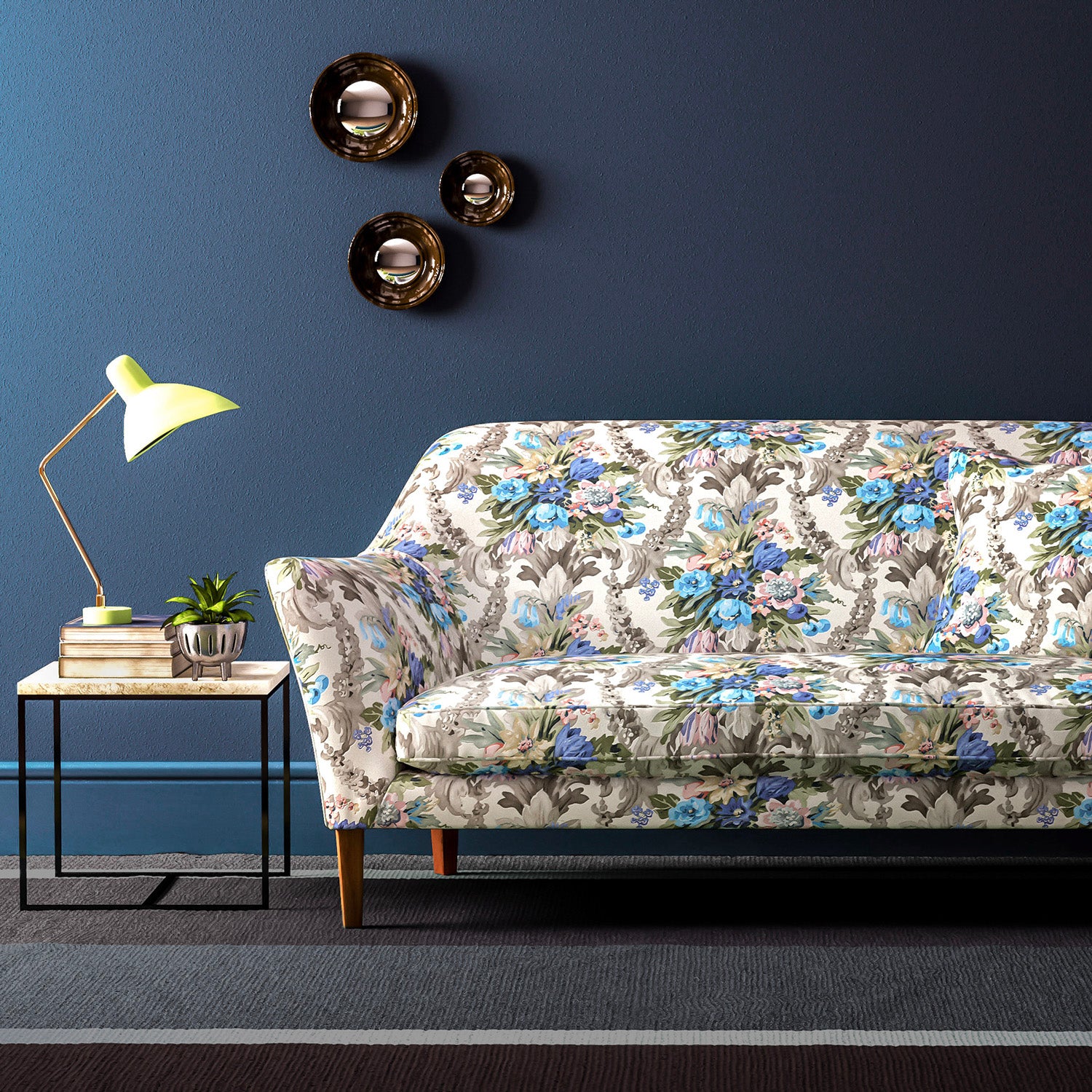 Sofa upholstered in a velvet upholstery fabric with stain resistant finish and vibrant colourful flower bouquet