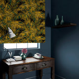 Patterned velvet blind in gold and green featuring a palm tree leaf design.