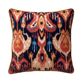 Velvet scatter cushion in a red and navy painterly-style pattern
