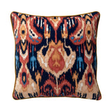 Velvet scatter cushion in a red and navy painterly-style pattern