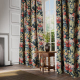 Curtains in a printed linen fabric with bouquets of roses in multicolours.