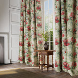 Curtains in a printed linen fabric with bouquets of red roses.