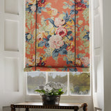 Blind in a printed linen fabric with bouquets of roses on an orange backdrop.