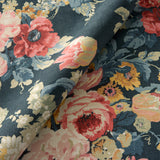Printed linen fabric with bouquets of roses in multicolours.