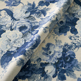 Printed linen fabric with bouquets of blue and white roses. 