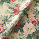 Printed linen fabric with bouquets of classic red roses.