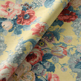 Printed linen fabric with bouquets of roses on a yellow background.