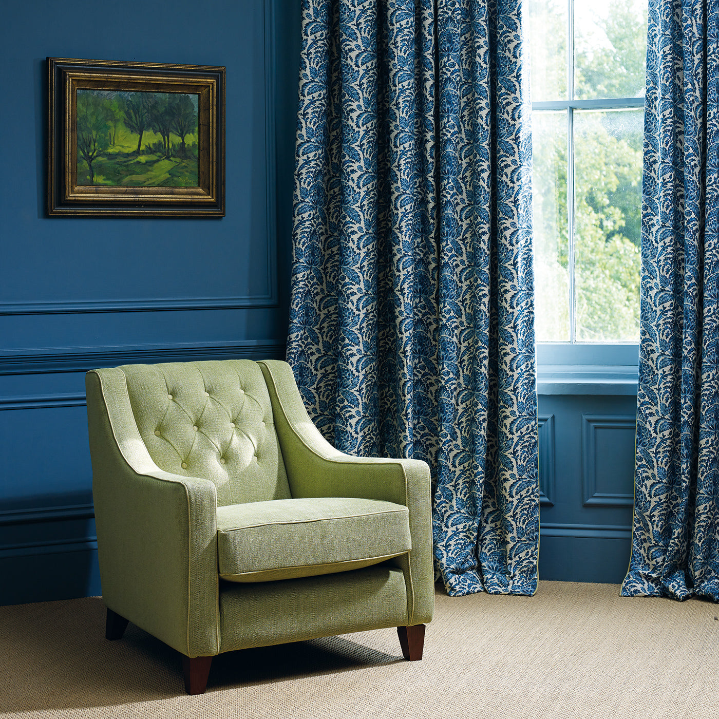 Curtains in a classic blue floral and leaf fabric