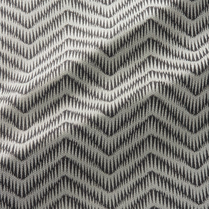 Fabric swatch of a herringbone weave design in a grey colour, suitable for curtains and upholstery