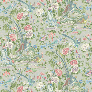 Fabric swatch of a lively, floral and bird fabric for curtains and upholstery