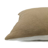 A white and brown two tone linen cushion.