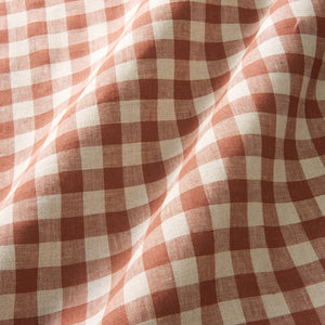 A versatile checked linen fabric in Ember for curtains, blinds, and cushions.