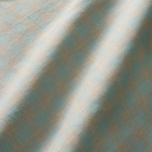 A versatile checked linen fabric in Sky for curtains, blinds, and cushions.