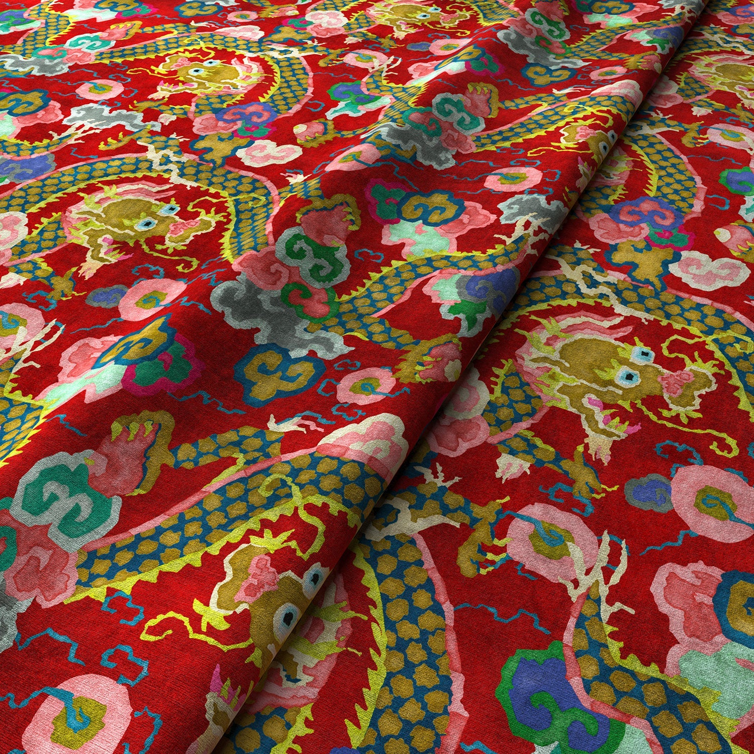 Printed velvet fabric with intricate mirror dragon design in red colours, for upholstery and curtain use.