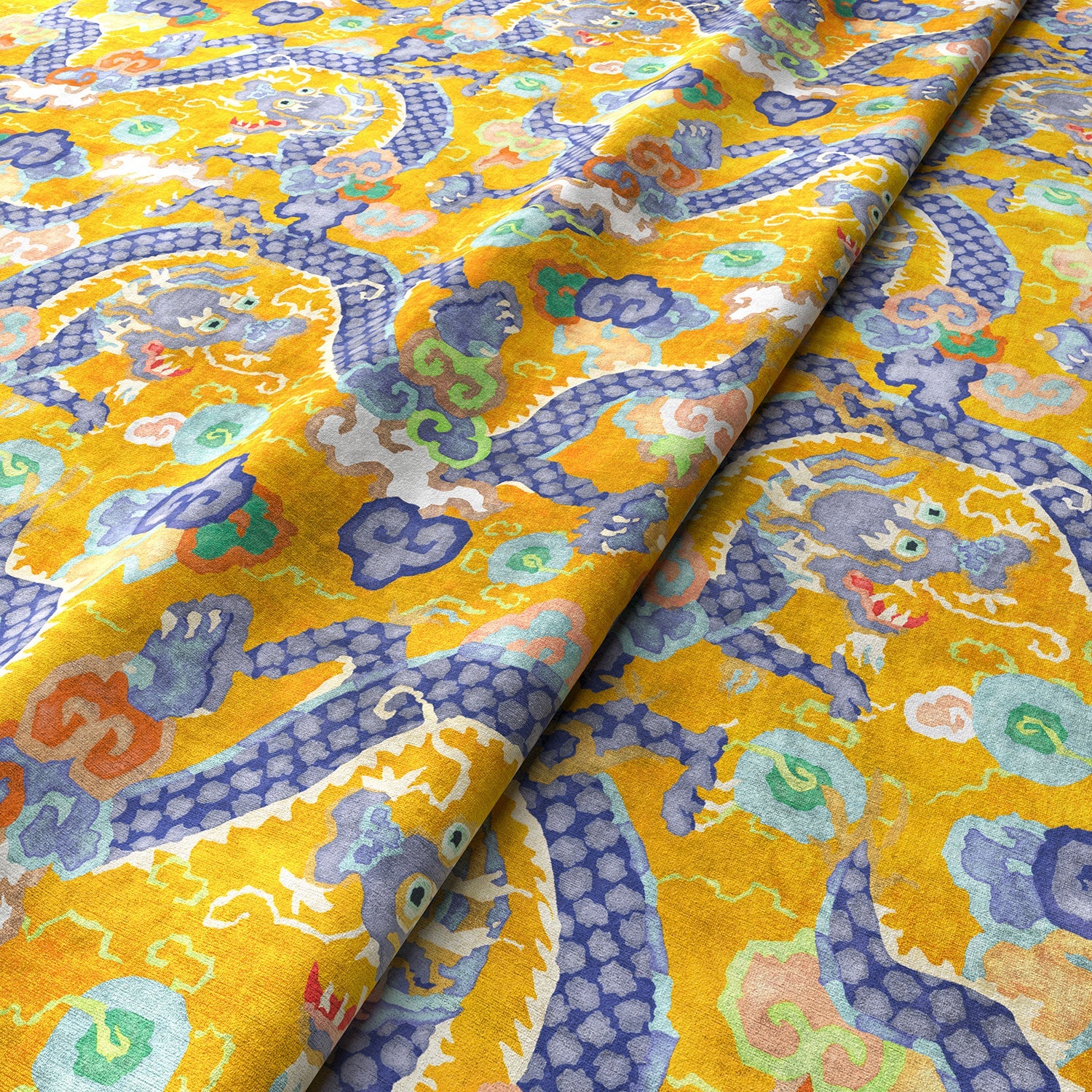 Printed velvet fabric with intricate mirror dragon design in yellow colours, for upholstery and curtain use.