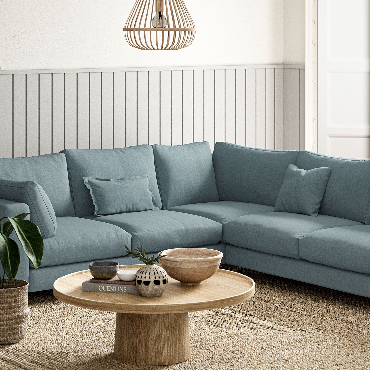 Sofa upholstered in Cerulean linen fabric 