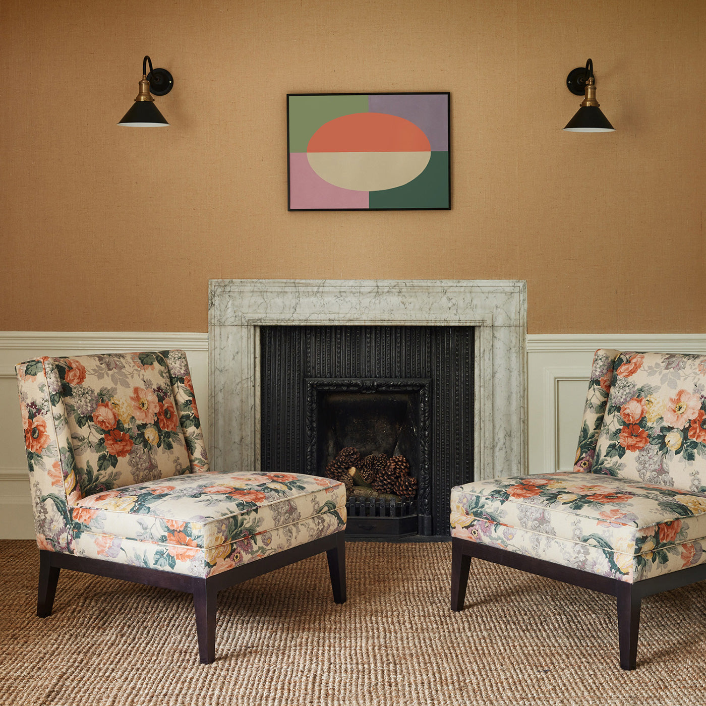 Chairs in a printed linen fabric with bouquets of roses on a tea-stained background.