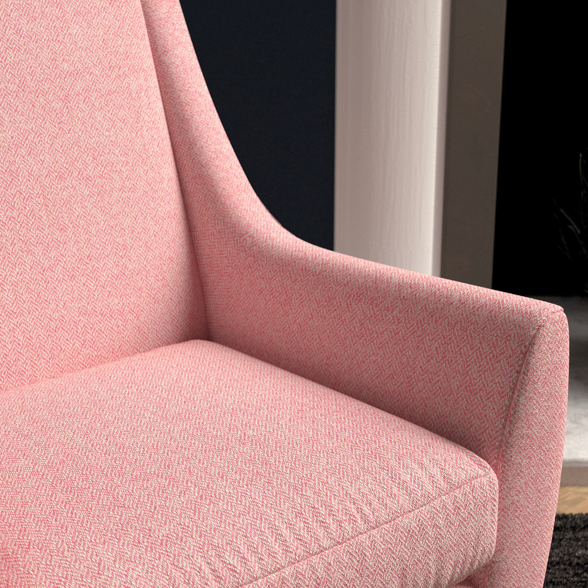 Chair upholstered in a candy pink herringbone wool weave upholstery fabric