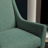 Chair upholstered in a seagreen herringbone wool weave upholstery fabric