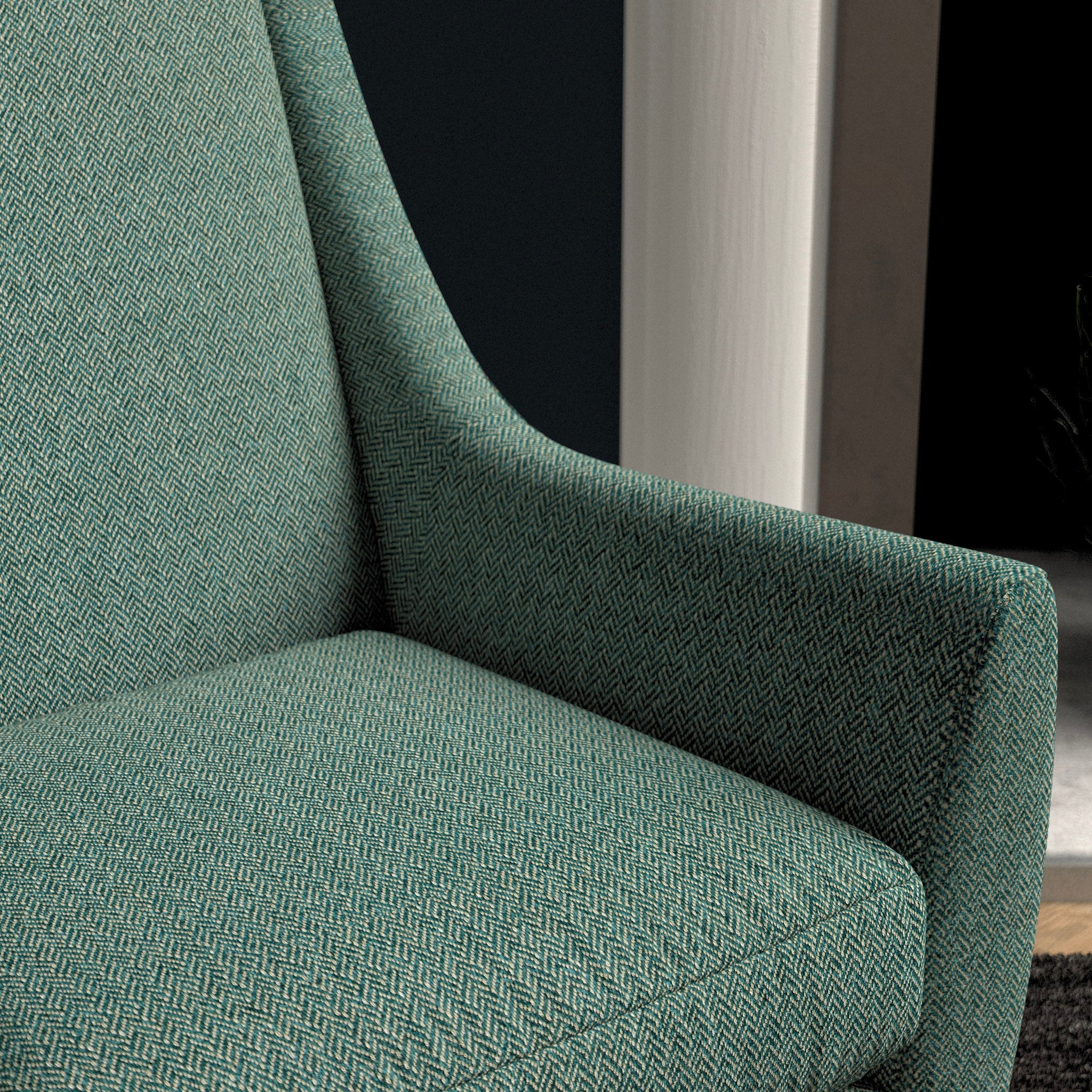 Chair upholstered in a seagreen herringbone wool weave upholstery fabric