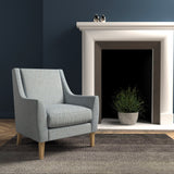 Chair in a light blue herringbone wool upholstery fabric